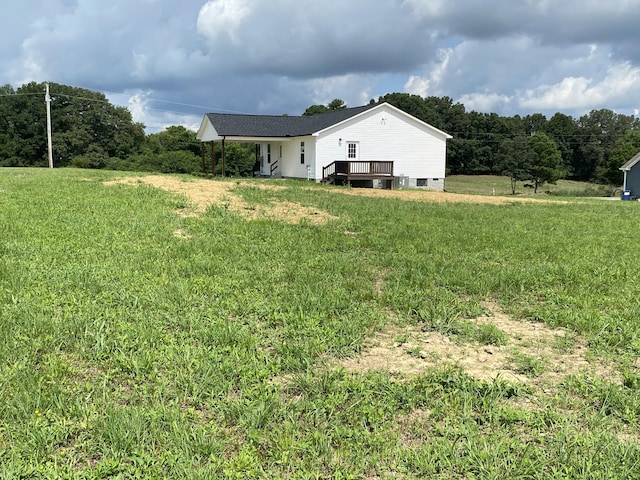 369 Brace Loop, Summertown, TN 38483 - view of green lawn featuring a wooden deck