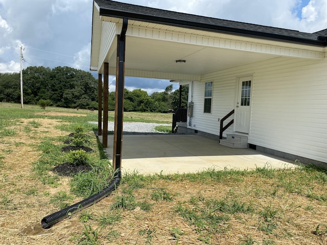 369 Brace Loop, Summertown, TN 38483 - view of patio / terrace featuring entry steps and a carport