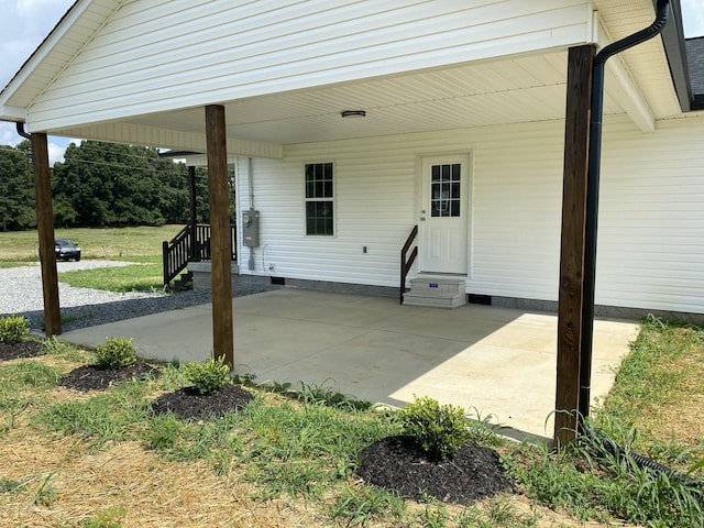369 Brace Loop, Summertown, TN 38483 - view of patio / terrace featuring entry steps and a carport