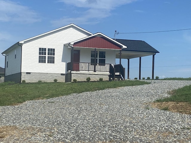 369 Brace Loop, Summertown, TN 38483 - view of front of property with a porch, gravel driveway, an attached carport, and crawl space