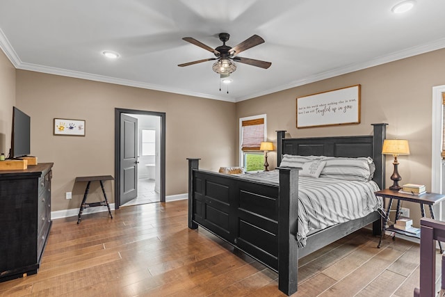 268 Planters Cir, Leoma, TN 38468 - bedroom with multiple windows, hardwood / wood-style flooring, ornamental molding, recessed lighting, and connected bathroom