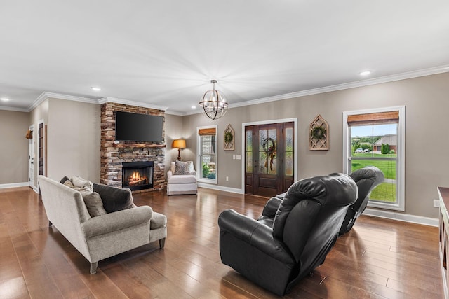 268 Planters Cir, Leoma, TN 38468 - living area featuring recessed lighting, a fireplace, a chandelier, wood-type flooring, and ornamental molding