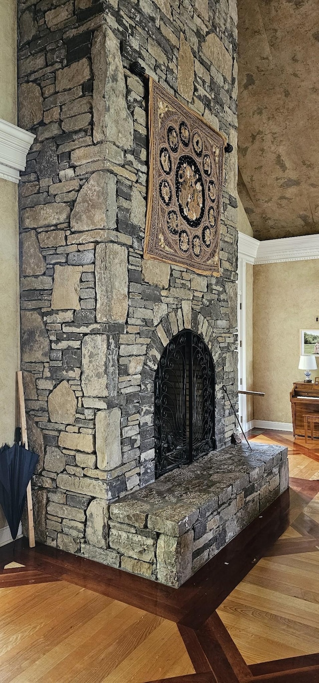 395 Allen Rd, Goodlettsville, TN 37072 - detailed view of a stone fireplace, wood finished floors, and crown molding