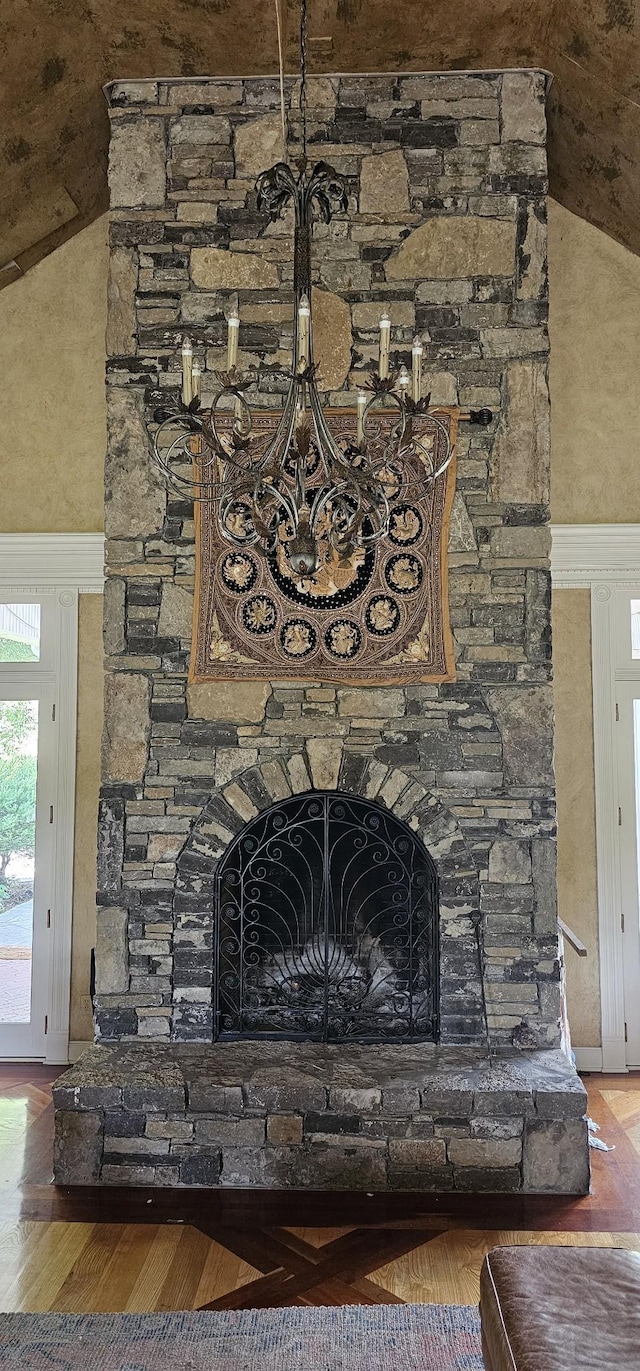 395 Allen Rd, Goodlettsville, TN 37072 - detailed view of a fireplace, wainscoting, wood finished floors, and a decorative wall
