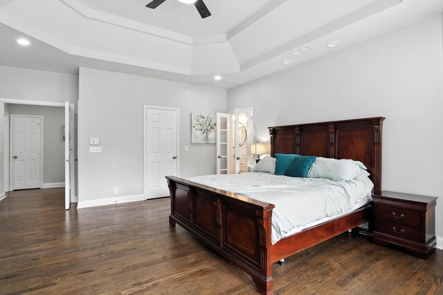 1069 Pleasant Valley Rd, Greenbrier, TN 37073 - bedroom with a raised ceiling, dark wood-style floors, recessed lighting, and ceiling fan