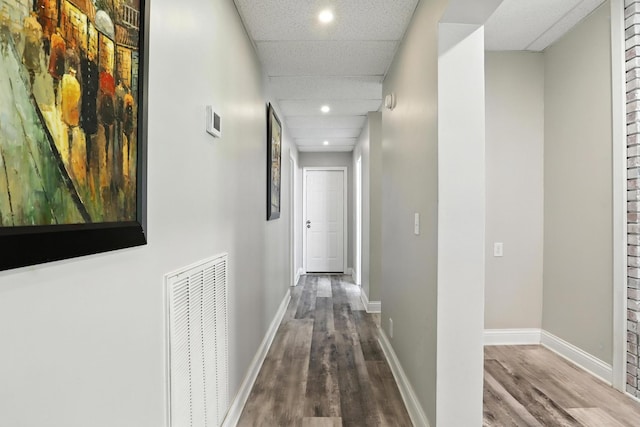 1069 Pleasant Valley Rd, Greenbrier, TN 37073 - hallway with wood finished floors, recessed lighting, and a drop ceiling