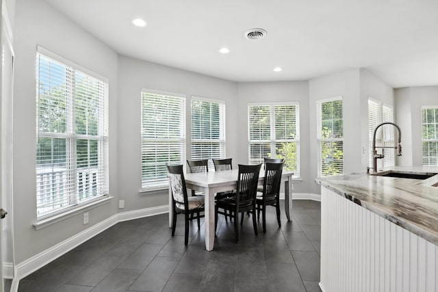 1069 Pleasant Valley Rd, Greenbrier, TN 37073 - dining area with plenty of natural light, recessed lighting, and dark tile patterned floors