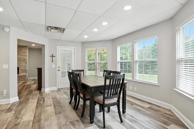 1069 Pleasant Valley Rd, Greenbrier, TN 37073 - dining area featuring light wood-style floors and a drop ceiling