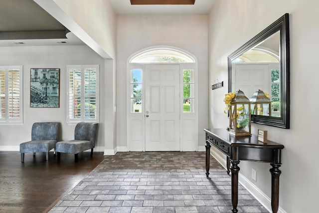 1069 Pleasant Valley Rd, Greenbrier, TN 37073 - foyer featuring plenty of natural light and brick floors