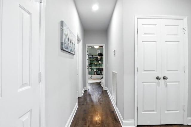 1069 Pleasant Valley Rd, Greenbrier, TN 37073 - hall with dark wood-type flooring and baseboards