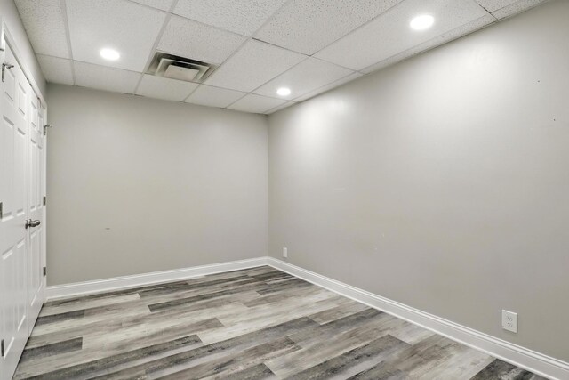 1069 Pleasant Valley Rd, Greenbrier, TN 37073 - empty room with wood finished floors, a paneled ceiling, and recessed lighting