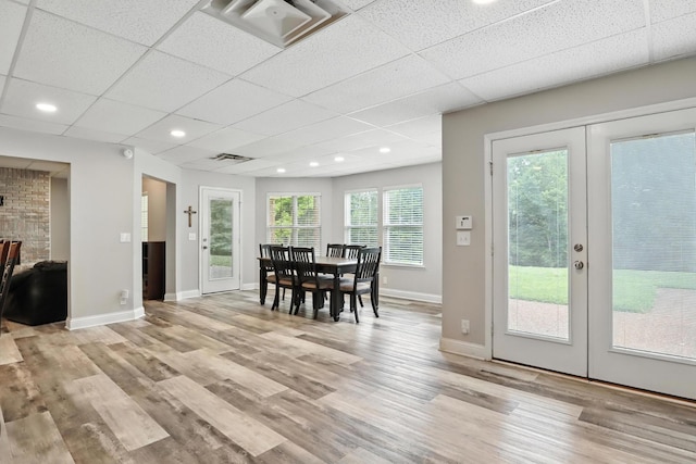 1069 Pleasant Valley Rd, Greenbrier, TN 37073 - dining room with french doors, wood finished floors, and a drop ceiling