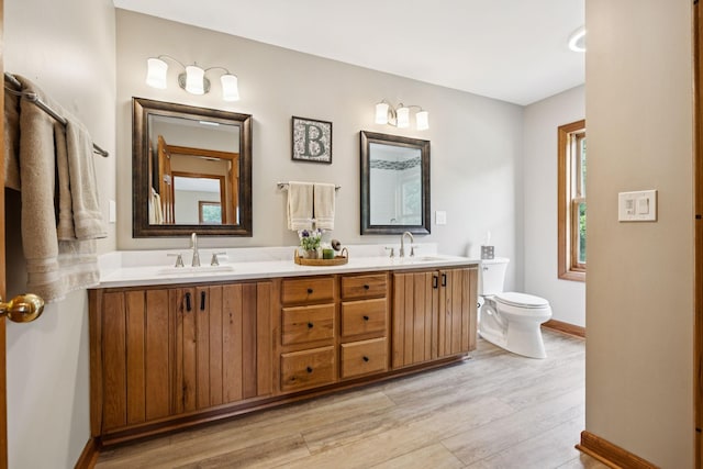 4255 Mcfall Rd, Cumberland City, TN 37050 - bathroom featuring wood finished floors and double vanity