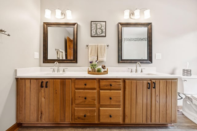 4255 Mcfall Rd, Cumberland City, TN 37050 - full bath featuring double vanity and wood finished floors