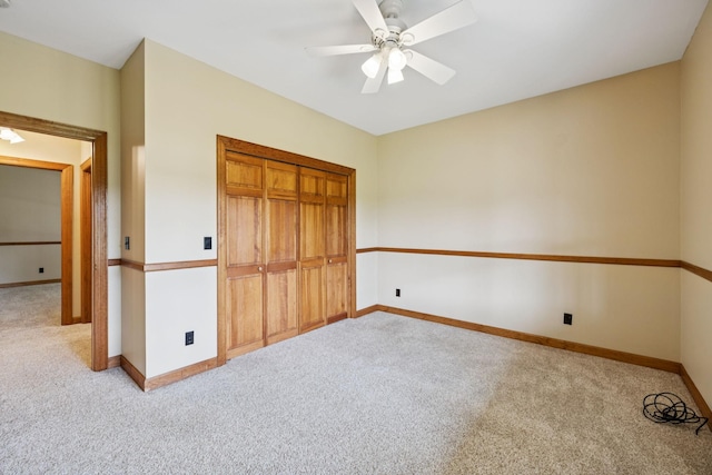4255 Mcfall Rd, Cumberland City, TN 37050 - unfurnished bedroom with carpet floors, a closet, and ceiling fan