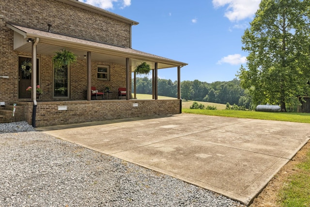 4255 Mcfall Rd, Cumberland City, TN 37050 - covered porch with a lawn