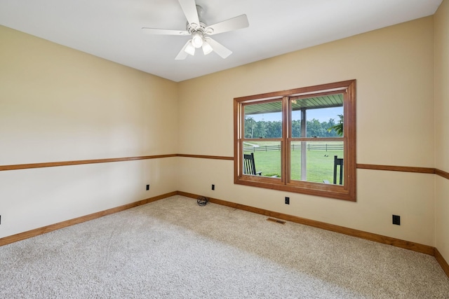 4255 Mcfall Rd, Cumberland City, TN 37050 - empty room featuring carpet flooring and a ceiling fan