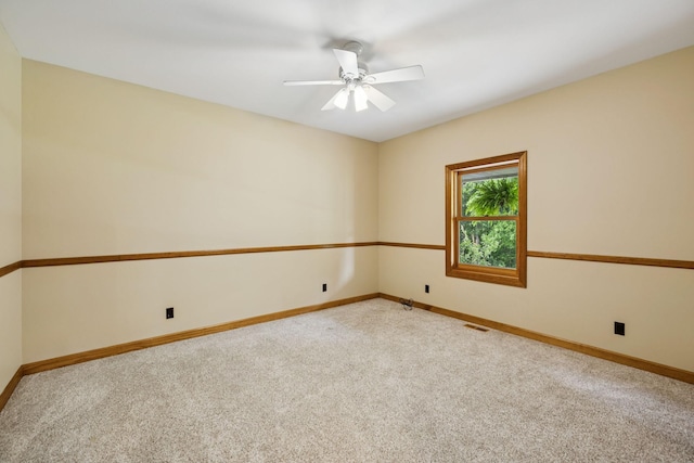 4255 Mcfall Rd, Cumberland City, TN 37050 - empty room featuring carpet and a ceiling fan