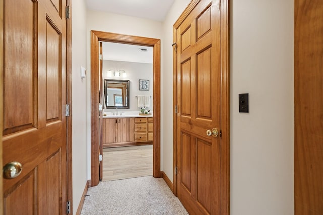 4255 Mcfall Rd, Cumberland City, TN 37050 - hallway with light carpet and baseboards
