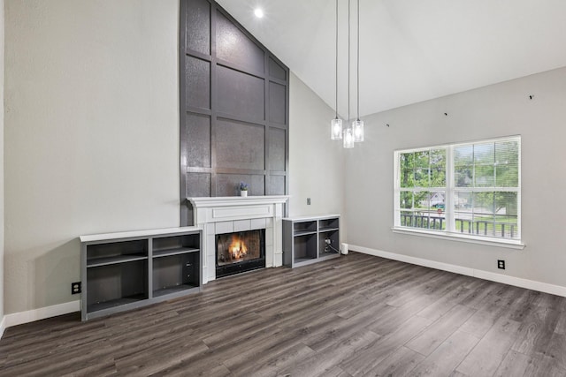 180 Bill Stewart Blvd, La Vergne, TN 37086 - unfurnished living room featuring a fireplace, dark wood-style floors, and high vaulted ceiling