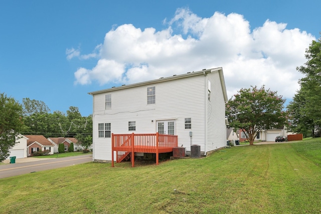 180 Bill Stewart Blvd, La Vergne, TN 37086 - rear view of house featuring a wooden deck, a yard, and french doors