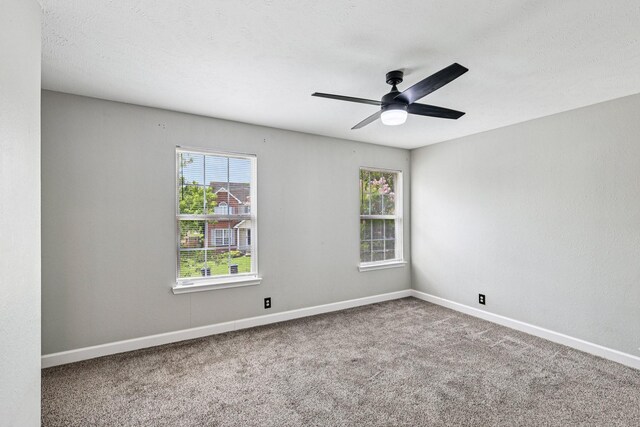 180 Bill Stewart Blvd, La Vergne, TN 37086 - carpeted empty room with healthy amount of natural light and ceiling fan
