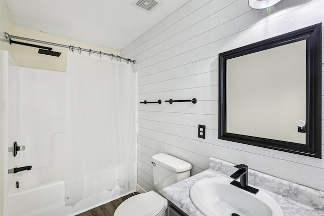 180 Bill Stewart Blvd, La Vergne, TN 37086 - full bath with shower / tub combo with curtain, vanity, wood walls, and wood finished floors