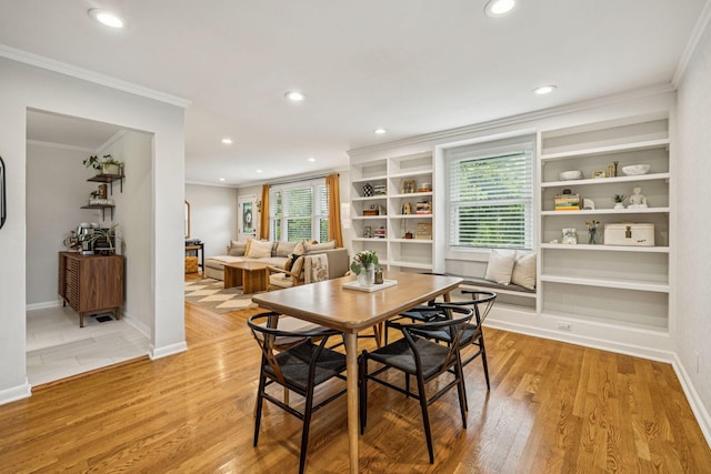 204 Eldon Ct, Nashville, TN 37214 - dining area featuring ornamental molding, recessed lighting, light wood finished floors, and built in shelves