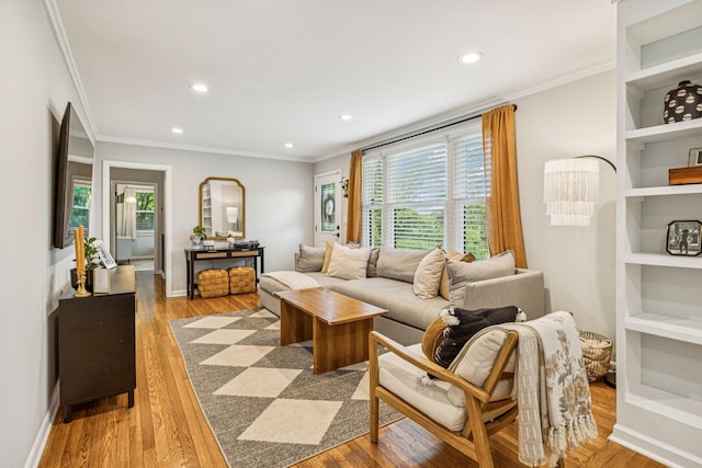 204 Eldon Ct, Nashville, TN 37214 - living room featuring recessed lighting, ornamental molding, and light wood-style floors