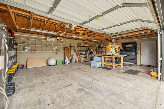 204 Eldon Ct, Nashville, TN 37214 - garage with a workshop area and a garage door opener