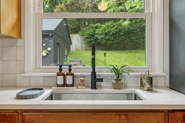 204 Eldon Ct, Nashville, TN 37214 - kitchen view of brown cabinetry and backsplash
