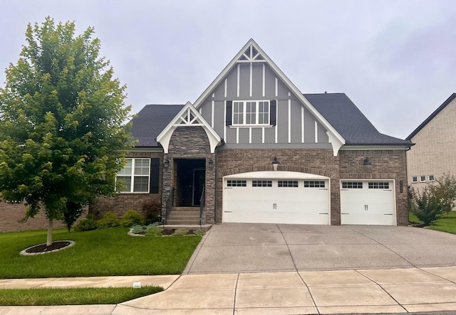 9008 Grayson Cir, Mount Juliet, TN 37122 - english style home featuring concrete driveway, a front yard, a garage, and brick siding