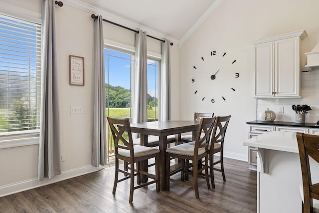 623 Josef Cir, Columbia, TN 38401 - dining area with crown molding, dark wood-style flooring, and lofted ceiling
