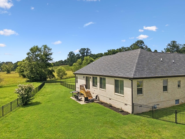 623 Josef Cir, Columbia, TN 38401 - rear view of property with roof with shingles, brick siding, crawl space, and a fenced backyard