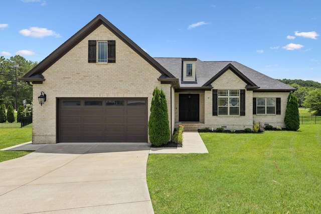 623 Josef Cir, Columbia, TN 38401 - view of front of home with brick siding, driveway, an attached garage, and roof with shingles