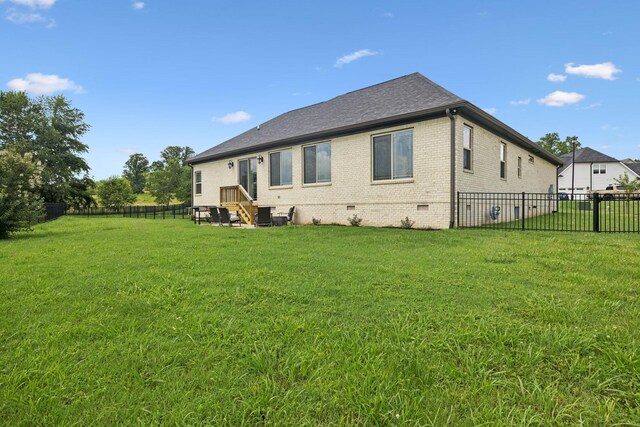 623 Josef Cir, Columbia, TN 38401 - rear view of house with crawl space, a fenced backyard, and brick siding