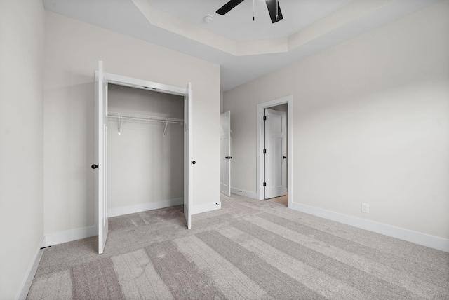 1311 Reda Dr, Clarksville, TN 37042 - unfurnished bedroom with light colored carpet, a closet, ceiling fan, and a raised ceiling