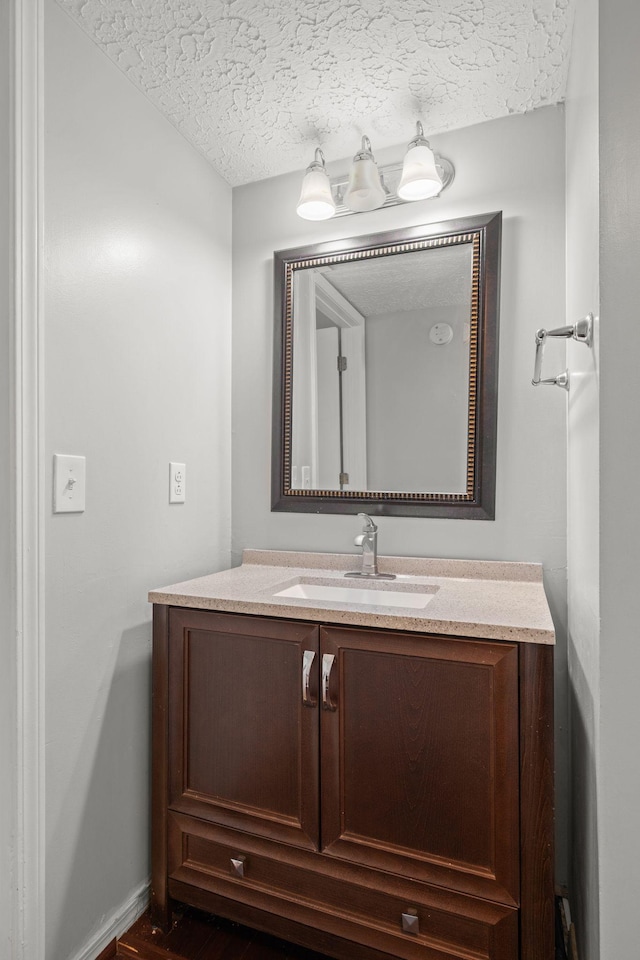 1029 Rachels Square Dr, Hermitage, TN 37076 - bathroom with vanity, a textured ceiling, and wood finished floors