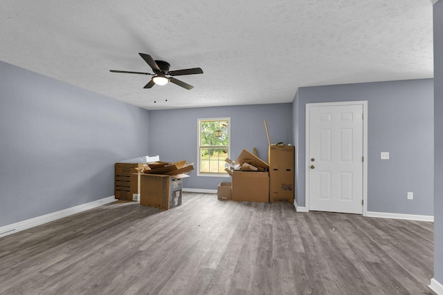 128 N C St, Hillsboro, TN 37342 - office area with wood finished floors, a textured ceiling, and a ceiling fan
