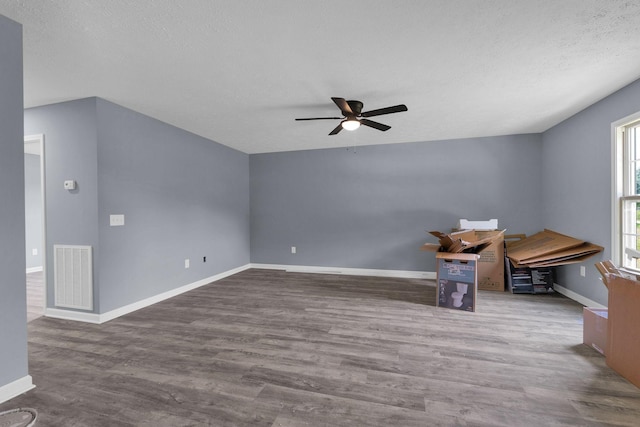 128 N C St, Hillsboro, TN 37342 - unfurnished room with ceiling fan, a textured ceiling, and wood finished floors