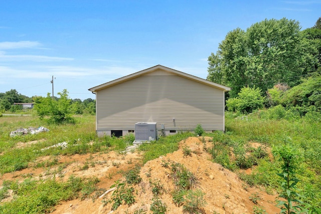 128 N C St, Hillsboro, TN 37342 - view of side of home featuring a cooling unit
