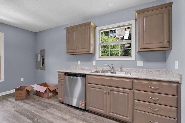 128 N C St, Hillsboro, TN 37342 - kitchen with dishwasher, electric panel, light wood-style floors, light countertops, and a textured ceiling