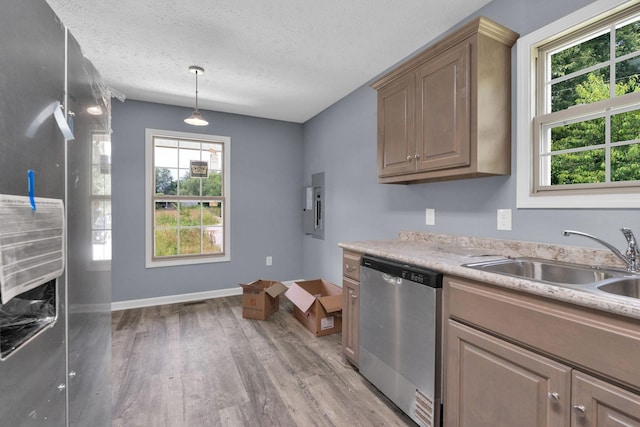 128 N C St, Hillsboro, TN 37342 - kitchen featuring dishwasher, light wood-style floors, a textured ceiling, light countertops, and electric panel