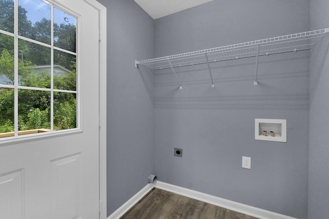 128 N C St, Hillsboro, TN 37342 - laundry room featuring electric dryer hookup, dark wood finished floors, and washer hookup