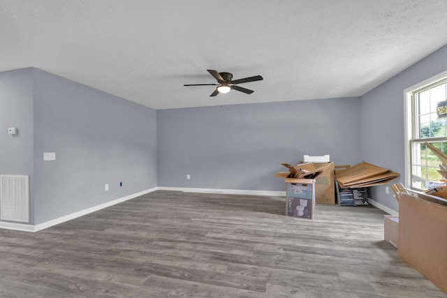 128 N C St, Hillsboro, TN 37342 - spare room featuring a ceiling fan, wood finished floors, and a textured ceiling