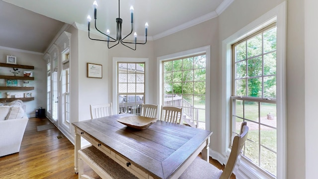 15505 Versailles Rd, Rockvale, TN 37153 - dining space with a chandelier, crown molding, and wood finished floors