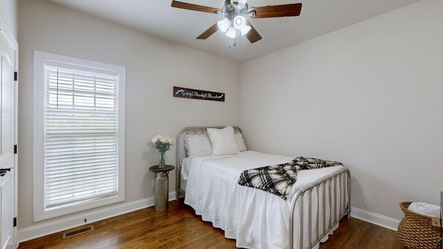 15505 Versailles Rd, Rockvale, TN 37153 - bedroom featuring wood finished floors, multiple windows, and a ceiling fan