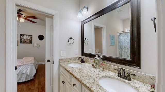 15505 Versailles Rd, Rockvale, TN 37153 - ensuite bathroom featuring double vanity, wood finished floors, and ceiling fan