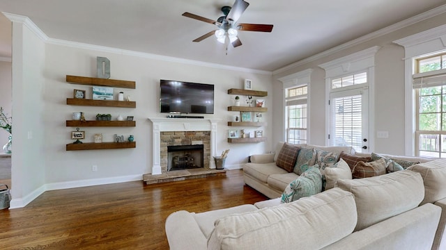 15505 Versailles Rd, Rockvale, TN 37153 - living room featuring dark wood finished floors, ceiling fan, crown molding, and a fireplace