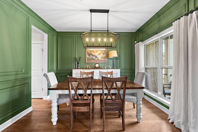 2213 Kirkwall Dr, Nolensville, TN 37135 - dining room with a decorative wall and dark wood finished floors